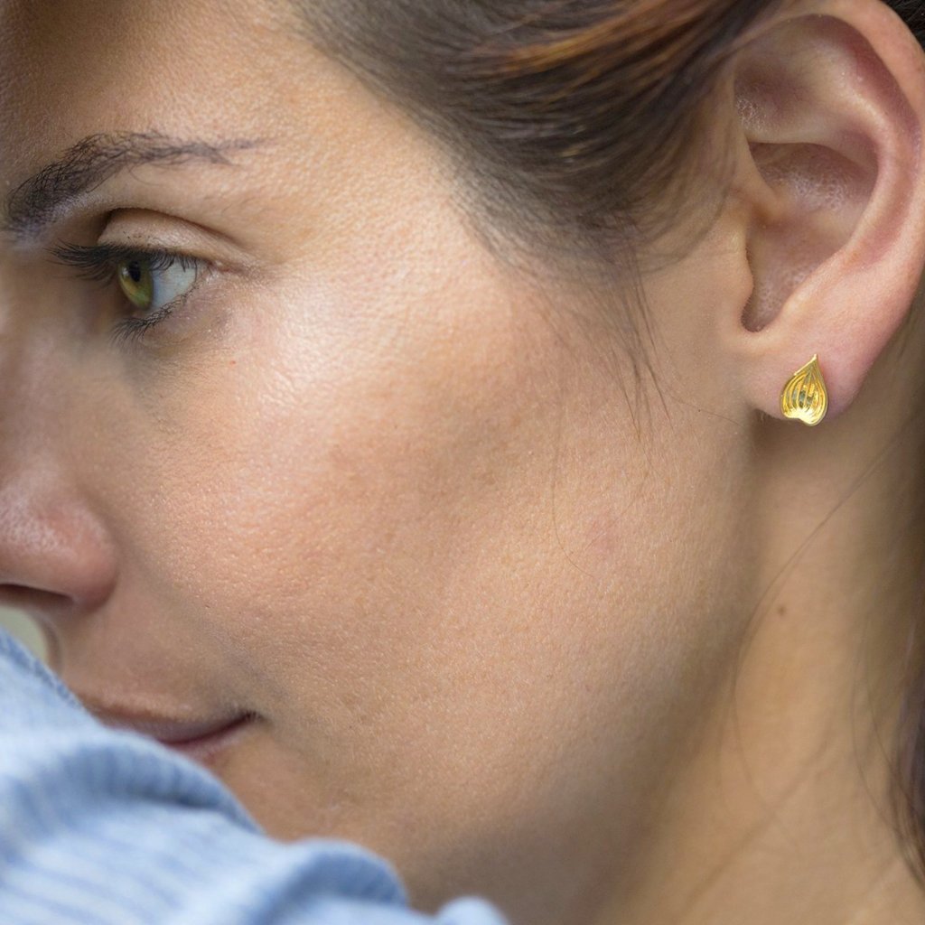 Jivan Lotus Petal Earrings gold model spiritual jewelry