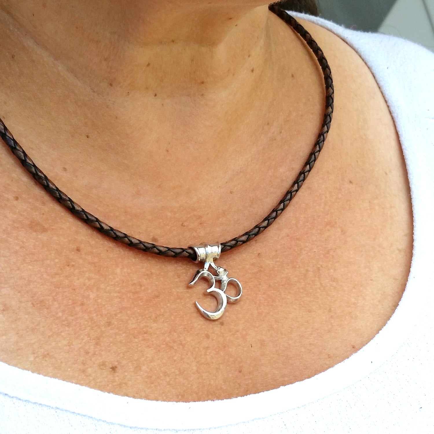Om Necklace on Braided Cord